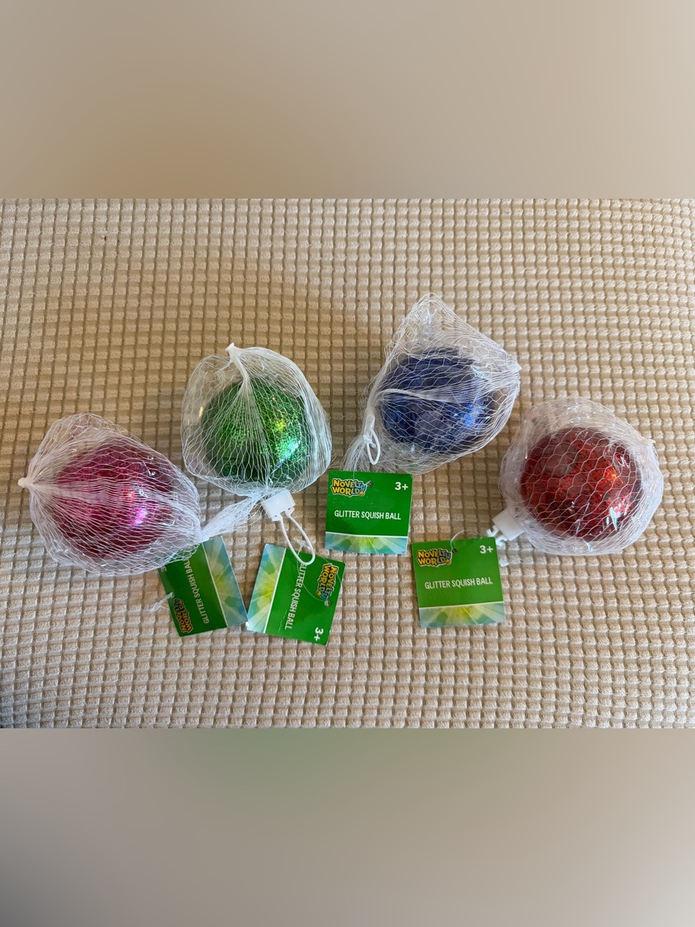 Glitter Squish Ball - Assorted Colors (Pink, Green, Blue, Red)